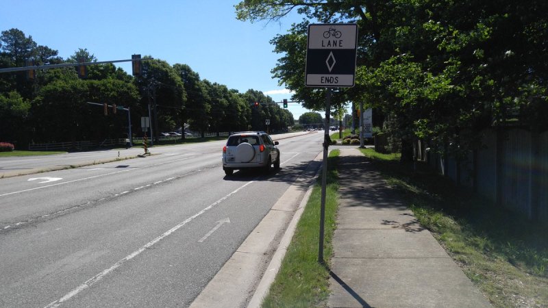 Signs that say "Bike Lane Ends" now have the official stamp of approval in the Manual on Uniform Traffic Control Devices. That's what counts as progress. Photo: Phil Riggan via Twitter