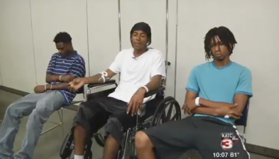 After a truck driver struck and injured Deonte Williams, Cody Mayes, and Tevin Wilson, police charged them for not wearing reflecting clothing at night. The driver was not charged. Photo:  KATC