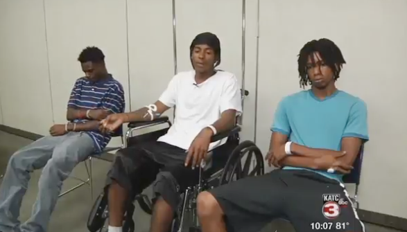 After a truck driver struck and injured Deonte Williams, Cody Mayes, and Tevin Wilson, police charged them for not wearing reflecting clothing at night. The driver was not charged. Photo: KATC