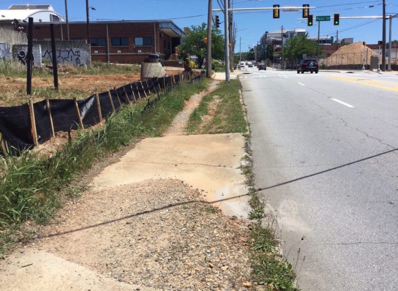 Many city streets like Memorial Drive in Atlanta, above, are controlled by state DOTs, which makes it harder -- but not impossible -- to make walking and biking safer. Photo: ThreadATL