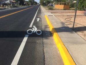 A lot of folks in Albuquerque are scratching their heads about this unorthodox new bike lane. Photo:  Better Burque
