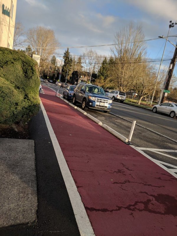 Seattle DOT Director Dongho Chang calls this cheap-and-easy sidewalk trick a "protected walking lane." Photo: Dongho Chang