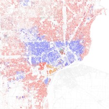 The red dots represent white residents and the blue dots represent black residents in this map of metro Detroit. It's easy to see Eight Mile Road, the dividing line between Wayne County, which includes Detroit, and suburban Oakland and Macomb counties to the north. Map: Eric Fischer