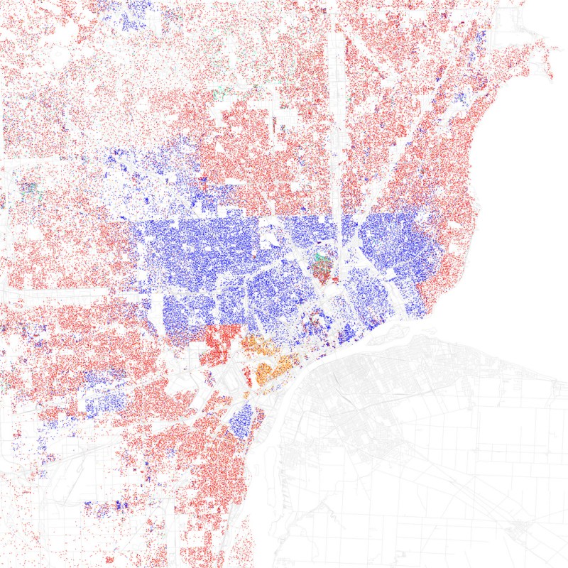 The red dots represent white residents and the blue dots represent black residents in this map of metro Detroit. It's easy to see Eight Mile Road, the dividing line between Wayne County, which includes Detroit, and suburban Oakland and Macomb counties to the north. Map: Eric Fischer