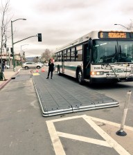Oakland built a bus stop platform on Telegraph Avenue using modular plastic components. Photo:  TransitCenter