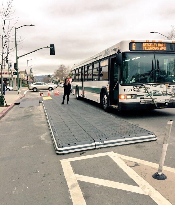 Oakland built a bus stop platform on Telegraph Avenue using modular plastic components. Photo: TransitCenter