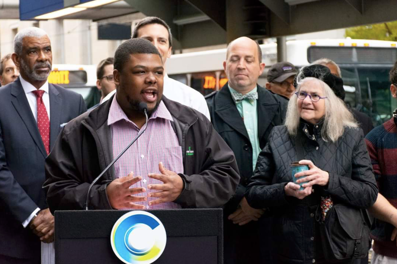 Cam Hardy, the volunteer advocate who led the fight for Cincinnati's first dedicated bus lane, speaks at there ribbon cutting ceremony this morning. Photo: City of Cincinnati