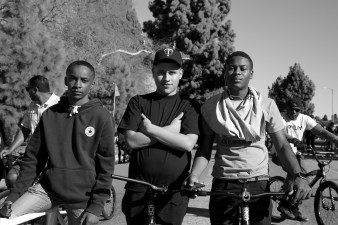 Cortez Wright, at right, first joined the guys he looked up to from BKoB in the King Day Parade when he was 13. Now 17, he and friends Prince (left) and Jacob (center) are the ones inspiring the next generation of riders. Sahra Sulaiman/Streetsblog L.A.
