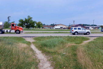 Foot paths worn by State Highway 1 near the Red Lake Nation tribal lands in Minnesota. Photo: Guillermo Narvaez