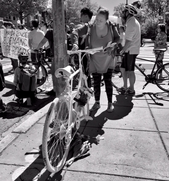 Volunteers installed a ghost bike for Dave Saloesh on Florida Avenue NE. Photo: Erickson Young on Twitter