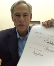 Texas Governor Greg Abbott after signing a bill banning red light cameras in the Lone Star State. Photo: Twitter