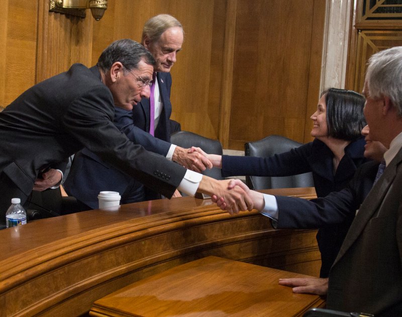 Senators John Barrasso and Tom Carper (left) introduced a $287 billion transportation infrastructure plan Monday.