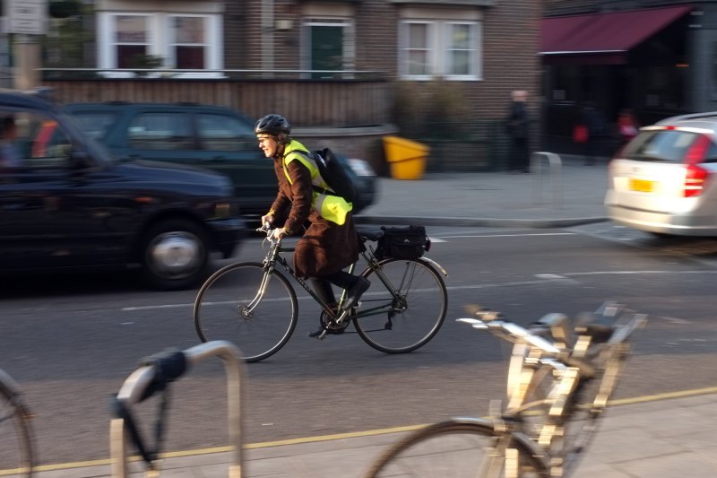 Helmets are too flimsy to protect cyclists says one British surgeon.