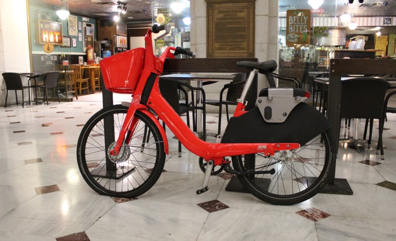 Cities are struggling to regulate electric bikes and scooters forcing some companies to remove them from city streets.