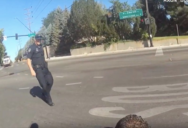 The scene in Boise moments after bicyclist Elizabeth Hilton was hit by a car. Hours later, she was issued a $90 ticket for running a red light.