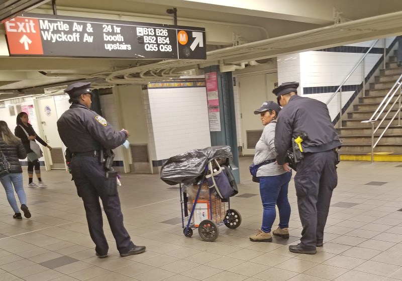 One of two women who were cuffed by the NYPD for selling churros in the subway. Photo: Rafael Martinez