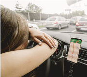 Expectation: car commercial model soaring gleefully through an uncongested downtown. Reality: This. Image via  Creative Commons.