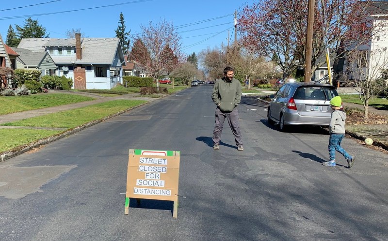 Many people have open spaces right in front of their homes, what if we discouraged driving on them and opened them up to safely-distanced play?
Photo: Sam Balto