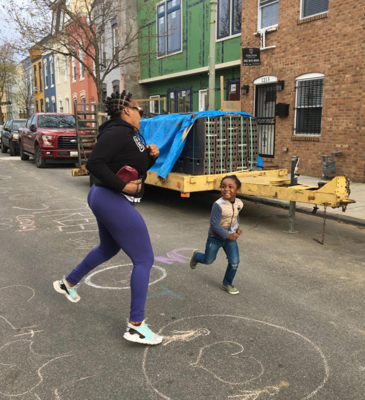 A family enjoys space to play on Wylie St NE. Image by Keya Chatterjee used with permission.