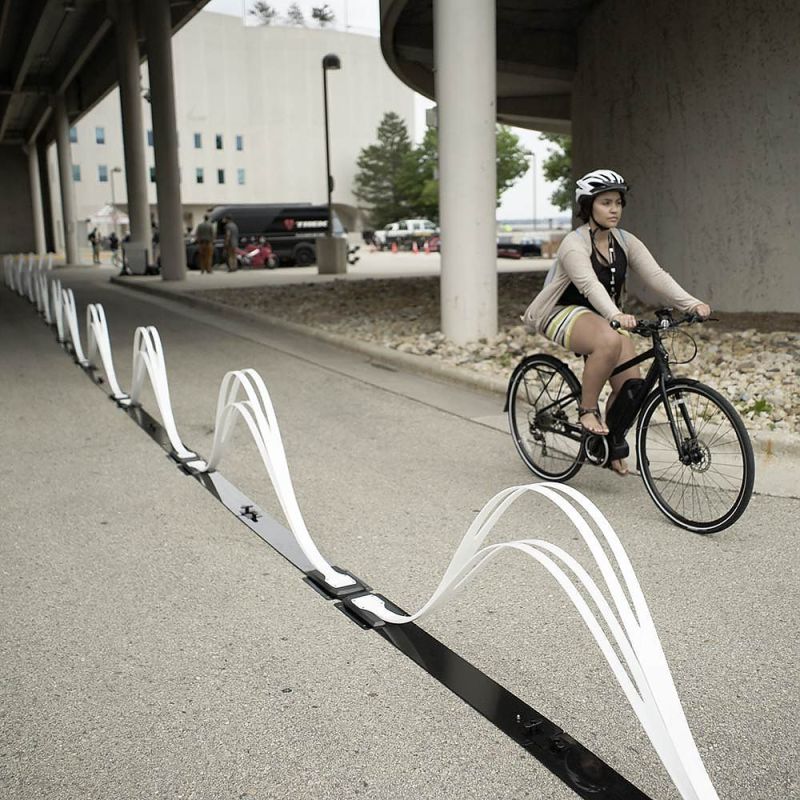 The Saris "Wave" delineator is one of a tiny handful of road barriers that both provide meaningful protection to the vulnerable *and* aren't hideous to look at. A new contest hopes to find more options — and make them cheap, sustainable and durable enough that cities have no excuse not to deploy them. Image source: Creative Commons.