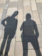 No one disagrees that these people are standing way too close for our current viral moment (unless they live together.) But the conversation over who has the "right" to the sidewalk during the COVID-19 pandemic isn't so simple. Source: Creative Commons.