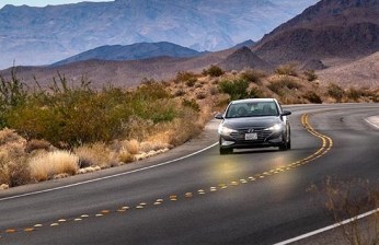 Even the government pushes people to drive on scenic roadways. Photo: National Park Service