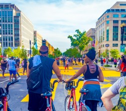 Cyclists on the Black Lives Matter Plaza, created by the Government of the District of Columbia, in the wake of the murder of George Floyd. Source: Ted Eytan via Creative Commons.