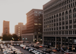 Buffalo passed a parking reform in 2017 to reduce parking requirements for new developments. A new study finds that mixed-use projects have since created 53 percent fewer spaces than previously required. (Stocksy / Chelsea Victoria)