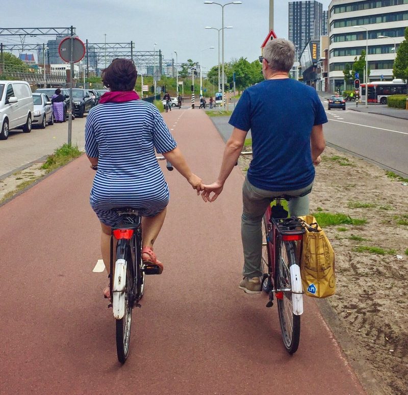 The authors cycle in their adopted hometown of Delft, NL. Image courtesy of Modacity.