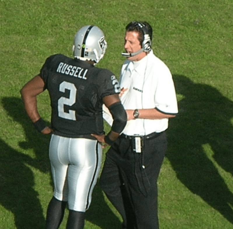 Greg Knapp coaches JaMarcus Russell of the Oakland Raiders. Image: BrokenSphere, CC