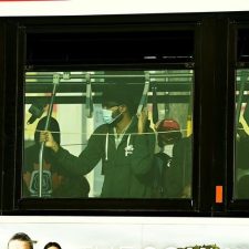 People are shoulder to shoulder inside a city bus while commuting at rush hour during the COVID-19 pandemic in Toronto. Via Canadian Press/Nathan Denette