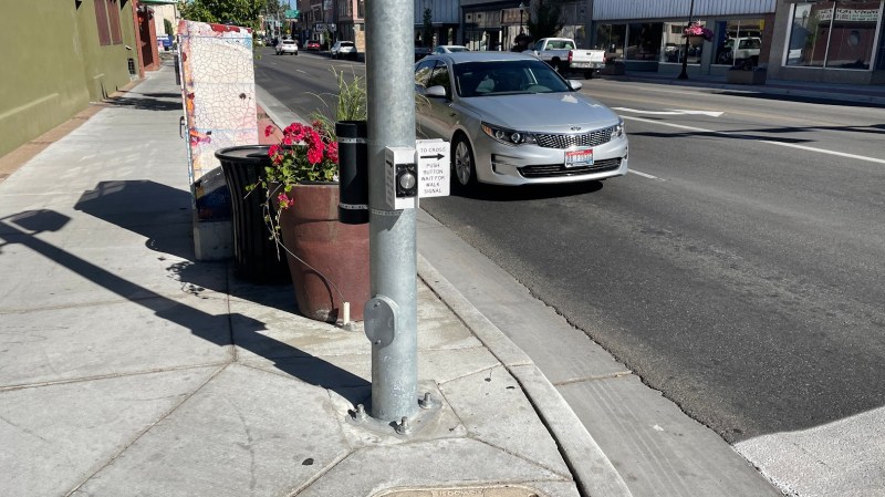 Pedestrian "beg" buttons, like this one in Idaho Falls, will no longer be built be facing the street when PROWAG becomes the standard. Image courtesy of the author.