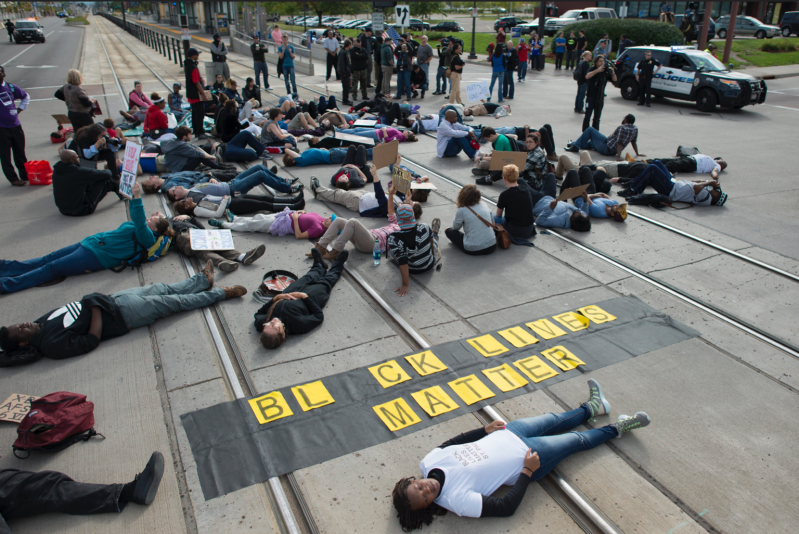 Protesters block the light rail line in St. Paul to protest the violent treatment of Marcus Abrams by St. Paul police, 2015. Photo: Fibonacci Blue, CC