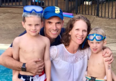 Image description: Sarah and Dan Langenkamp pose with their two young sons at a swimming pool. Photo: GoFundMe