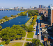 Storrow Drive in Boston (in reality, a highway) looks much better as a park and light rail in AI artist Zach Katz's rendering. Image: Zach Katz
